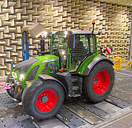 Tractor fixed on roller dynamometer with chains. (Image: Institute for Vehicle Systems Technology / KIT)