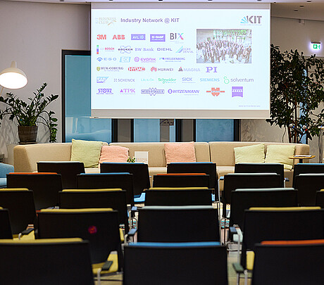 A picture of the prepared lecture room in the TRIANGEL Open Space before the arrival of the participants. (Photo: KIT)