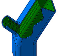 Aufbauschema des Rohrsegments: Strukturierte Innenwand (grün) und Außenwand (blau) mit einem dünnen Hohlraum für Isolatormaterial dazwischen.
